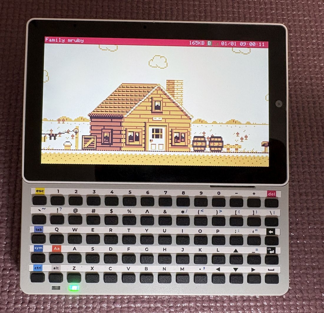 An M5Stack Tab5 running the Family mruby desktop, with the Tab5 Keyboard attached