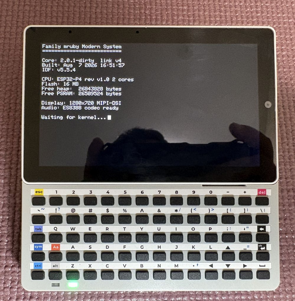 The text boot screen: core version, chip, free heap and PSRAM, display and audio